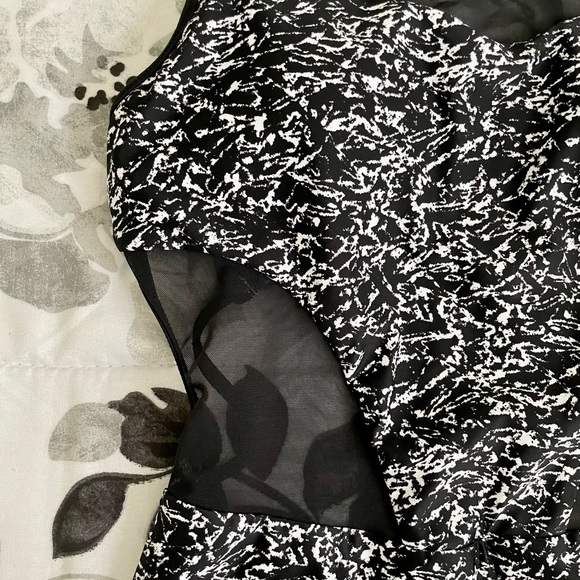 Rare LIKE NEW Lululemon cutout one piece swim suit with tie detail in back. - Picture 3 of 5